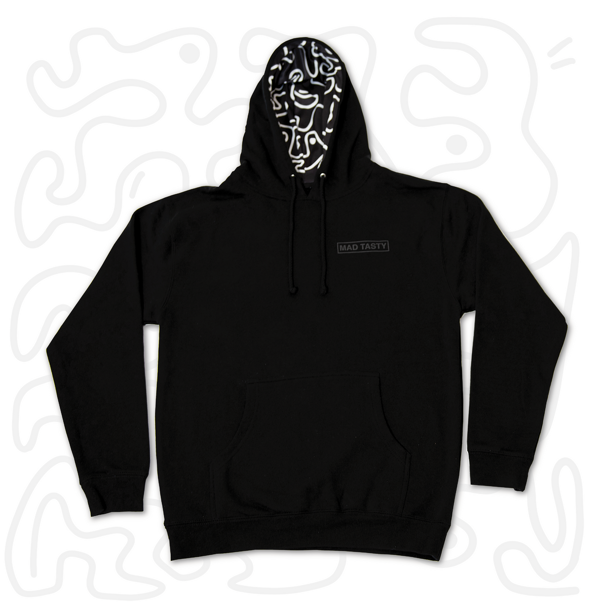 Cozy lined hoodie laid out  in black with a monochromatic raised MAD TASTY logo and hoodie lined with our signature squiggle line art.